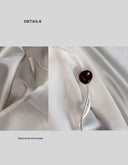 Off-White Rayon Halterneck Backless Asymmetric Drape Longline Top
